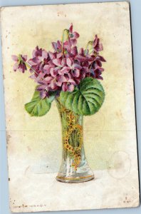 Ornate vase with flowers greetings postcard (c) 1909