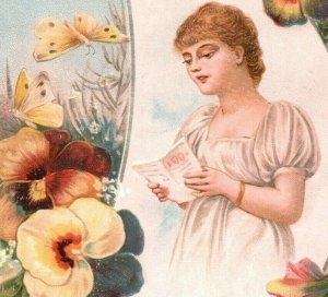 1880s-90s Victorian Card Lovely Young Lady Pansies P216