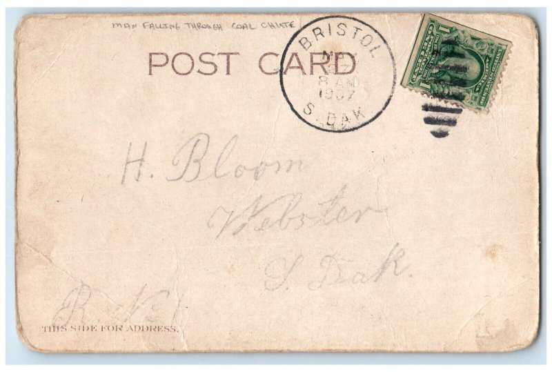 1907 Man Falling Through Coal Chute Bristol South Dakota SD Antique Postcard