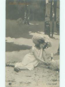 rppc c1910 Easter CUTE GIRL FEEDING WHITE BUNNY RABBIT AC8582