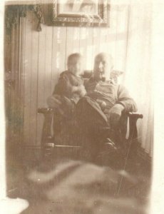 c1910's Grandpa Smoking Pipe Little Boy Sitting Chair RPPC Photo Postcard 