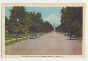 P2989, old postcard residential section ouellette ave scene old cars windsor