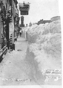 Ironwood Michigan Blizzard Snowstorm Coke Sign Real Photo Postcard AA111495