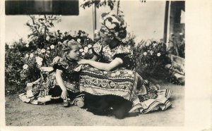 Folk costumes Hungary girl head decoration Mezokovesd national costume 1936