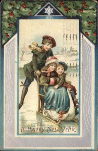 New Year Ice Skating Boy Pushes Girls on Swan Chair c1910 Vintage Postcard