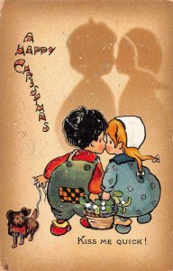 Christmas Greetings Children with Dog Kissing Tuck Vintage Postcard AA39939
