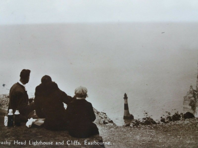 Family Enjoying a Picnic at Beachy Head Lighthouse Eastbourne RP Postcard 1939