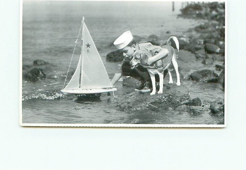 Buy Postcard Little boy sailing his Sailboat