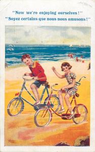 now we`re enjoying ourselves children couple bicycles seaside beach artist pc