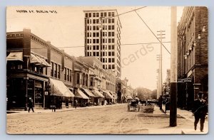 J90/ Berlin Wisconsin RPPC Postcard c1910 Huron Street Stores Wagon  218