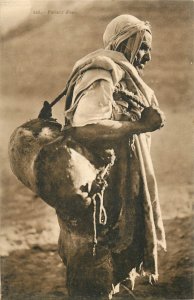 Postcard Arab Tunisian Man Water Carrier Goat Skins 228 Photogravure
