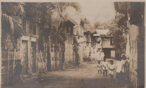 RPPC RESIDENTIAL AREA CAMP PHILIPPINES ISLANDS REAL PHOTO POSTCARD (c. 1910)