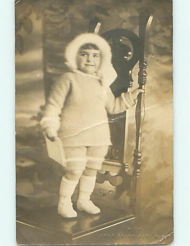 Bent Pre1924 rppc GIRL IN WINTER CLOTHES BUT WITH BARE LEGS Manhattan NY r6920