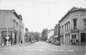 J74/ Sparta Wisconsin RPPC Postcard c40-50s Street View Stores 117