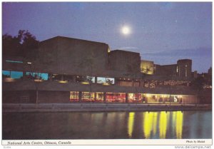 Evening view across the Rideau Canal, National Arts Centre, Ottawa, Ontario, ...