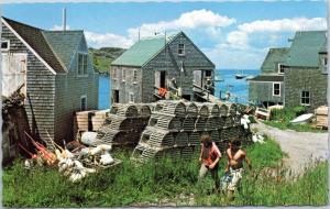 Maine Fishing village - two men walking next to lobster crates