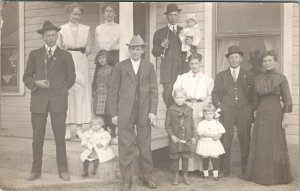 RPPC Victorian Family On Porch Men With Antique Long Stem Pipes Postcard U12