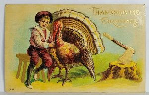 Thanksgiving Child With Turkey and Axe  Golden Accents Embossed Postcard T1