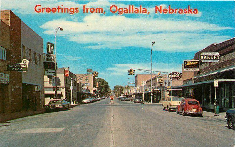 Autos 1960s Ogallala Nebraska Postcard Street Scene Dunlap postcard 11379