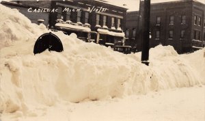 J37/ Cadillac Michigan RPPC Postcard c1931 Blizzard Snow Drift Store 105