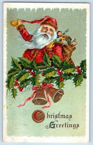 Christmas Postcard Greetings Santa Claus Sack Of Toys Holly Berries Bell 1911
