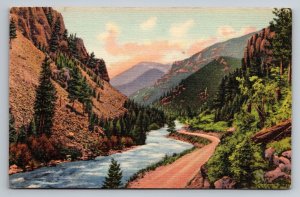 Pines & Cliffs Along A Canon In The Rockies Vintage Unposted Linen Postcard