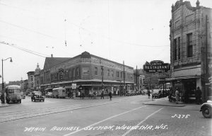 J74/ Waukesha Wisconsin RPPC Postcard c40-50s Business Section Stores 1