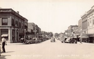 J74/ Wayne Nebraska RPPC Postcard c30-50s Street Scene Stores 392