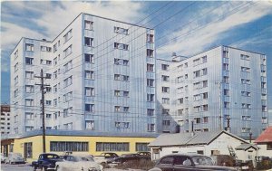 Fairbanks Alaska Northward Building Roberts Johnston autos Postcard 22-624