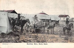 Rawlins Wyoming Early Days Covered Wagons Vintage Postcard AA56471