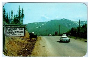 LOOKOUT PASS,  IDAHO/MONTANA ~ Scene at SUMMIT  c1950s Cars Postcard