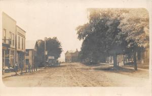 F19/ Dayton? Pennsylvania RPPC Postcard Hotel Stores Main St?