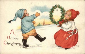 CHRISTMAS Boy and Girl Throw Snowballs CUTE KIDS c1910 Postcard