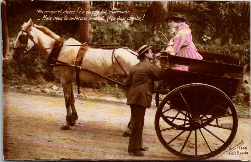 RISQUE POSTCARD WWI RPPC FRANCE YOUNG LADY & MAN ROMANCE WAGON