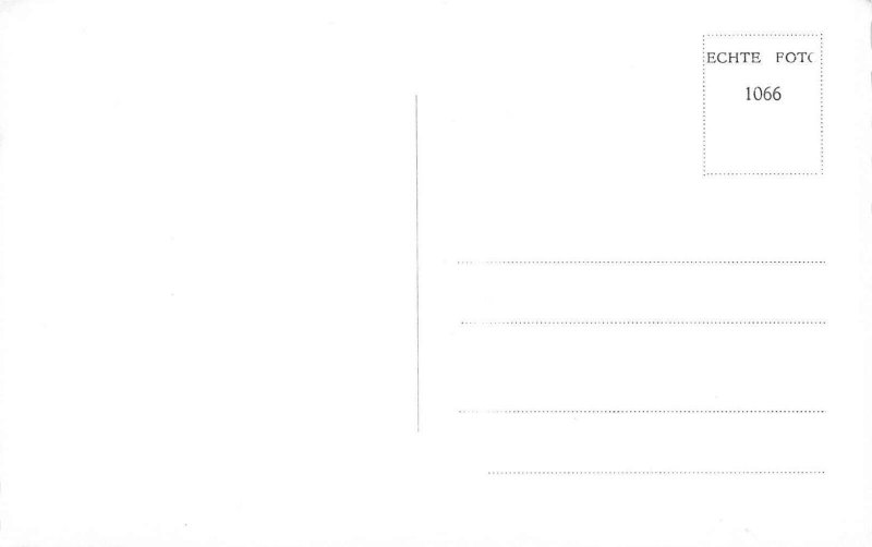 Smiling Woman Dutch Stamp Language Postzegeltaal RPPC postcard