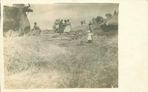 C-1910 Farm Agriculture Women Grain Sacks RPPC Photo Postcard 8556