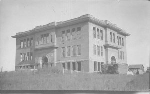 PLAINVIEW NE~NEW PUBLIC SCHOOL BUILDING UNDER CONSTRUCTION-REAL PHOTO POSTCARD