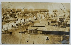 RPPC Early Town View JANESVILLE MINNESOTA Businesses People Dirt Rds Postcard P7