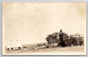 RPPC Homestead Scene after the Storm Downed Barn Fence Postcard E23