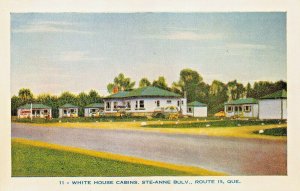 STE-ANNE QUEBEC CANADA~WHITE HOUSE CABINS-1950s POSTCARD