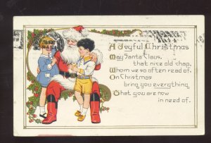 SANTA CLAUS BOY AND GIRL ON LAP VINTAGE CHRISTMAS POSTCARD FRANKLIN N.H.