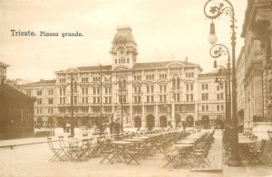 Italy Trieste central square clocktower terrace cafe tables