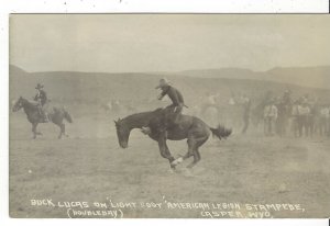 POSTCARD BUCK LUCAS ON LIGHTFOOT AMERICAN LEGION STAMPEDE CASPER WYOMING RPPC