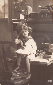 J65/ Interesting RPPC Postcard c1910 Pretty Girl Top Hat Office Books 399