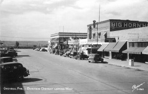 Postcard RPPC Wyoming Greybull Avenue Business District Sanborn Autos 23-6748