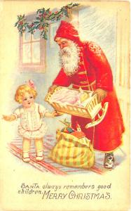 Christmas Red Suited Santa Claus Doll & Cradle Young Girl Postcard