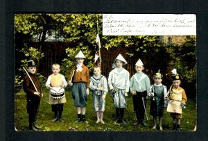 #741 Netherlands 1900s (8) kids Dressed in Military Helmets Drums Sword Rifle