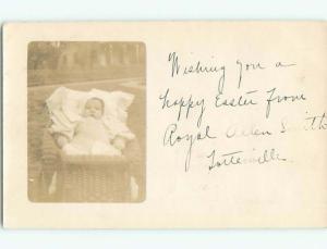 1909 rppc BABY IN ANTIQUE RATTAN BASKET o2159