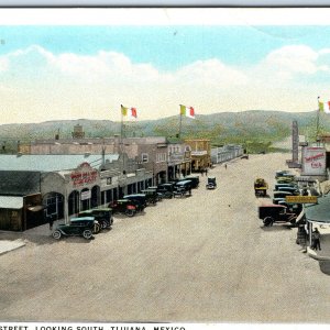 c1920s Tijuana, Mexico Main Street Looking South PC Mint Bar Flags Cars A346