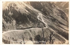 SCENE FROM RED LODGE HIGHWAY-COOKE CITY YELLOWSTONE PARK MT~REAL PHOTO POSTCARD